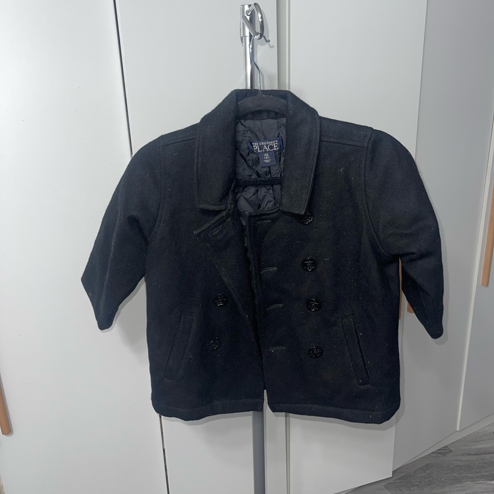 This cute boy or girl coat has only been worn once.